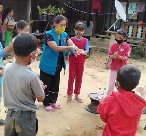 An ASHA worker in Longleng demonstrates hand washing technique to children in the community. Healthcare workers, who are on the frontlines of the fight against the COVID-19 pandemic, require the full support of the government and the people.